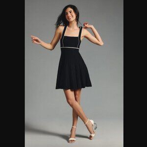 Elegant Black Dress with White Accents